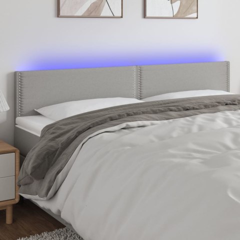 Zagłówek do łóżka z LED, jasnoszary, 200x5x78/88 cm, tkanina